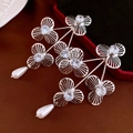 Detailed shot of silver flower earrings with zircon petals and white teardrop pearls - Silver Needle - Flower Water Drop Drop Earrings