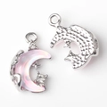Macro detail of silver moon and star pendant with pink resin and white rhinestones - Silver Pink