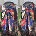 Navy blue ribbon hair bow clip featuring classic equestrian chain and bridle prints - Navy Blue Chain