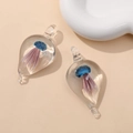 Detail of teardrop glass pendants with blue and purple 3D jellyfish interior art - Light Blue