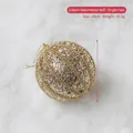 10cm Christmas ball ornament with gold glitter stripes and hanging string on snowy background - Gold Watermelon Ball 10CM