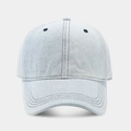 Detailed view of light blue washed denim baseball cap with triple-stitched curved brim - Adjustable / Light Blue
