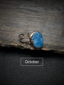 Close-up of vintage copper ring with blue raw gemstone for October birthdays - October - Blue Apatite
