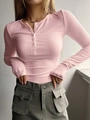 Rosafarbene, figurbetonte Rippstrick-Langarmshirt mit Knopfleiste am Rundhals - Rosa