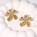 Exaggerated 18K gold plated stainless steel flower earrings on white ceramic tray - Gold