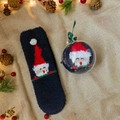 Navy blue Christmas coral fleece socks with Santa Claus pattern in a clear gift ornament - Navy Santa Claus
