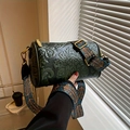 Detail of dark green embossed cylinder bag with vintage jacquard wide shoulder strap - Olive Green