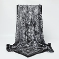 Detail of black and white paisley silk scarf draped elegantly on a display stand - Black Base Silver White Paisley (FT264-4)