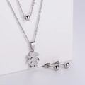 Minimalist silver jewelry set with beaded necklace, girl silhouette pendant and matching studs - Earrings + Pendant Set / Steel Color (Silver)