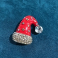 Sparkling Christmas hat brooch in red enamel with gold stars and white rhinestones - Santa Hat Brooch