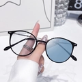 Classic black round-frame anti-blue light glasses with slim metal temples and clear lenses - Photochromic Blue / Shiny Black Silver Frame