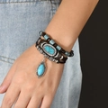 Detail of multilayer leather bracelet with turquoise pendant and beads on wrist - Oval Turquoise Multilayer Style (手链：款式六)