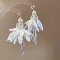 White floral tassel earrings with pearls and crystals for a sweet bohemian fashion style - White