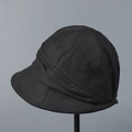 Detailed close-up of pleated texture on a black linen bucket hat for sun protection - M (56-58cm) / Black