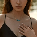 Minimalist 18K gold plated chain necklace with five turquoise beads on a female model - 18K Gold