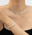 Minimalist silver snake chain necklace and bracelet set shown on female model - Silver Jewelry Set