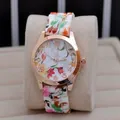 Detail of rose gold ladies quartz watch with floral patterns on dial and band - Pattern 5 (White Pastoral)
