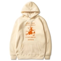 Halloween beige hoodie with witch riding a broom and I Can Drive A Stick slogan - Khaki