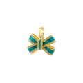 Macro shot of teal enamel bow pendant with small crystals on gold metal plating - Green