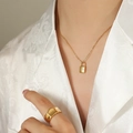 Collana con ciondolo a lucchetto dorato inciso con stella e zircone elegante - 40+5cm / Oro