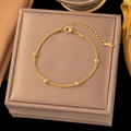 Elegant gold-plated stainless steel bracelet with four round beads and lobster clasp - E2180 Starry Sky Bead Gold Bracelet