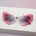 Pink heart-shaped sunglasses with white star patterns and gradient purple lenses - Red Star