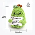 Detail showing hand-knitted green potato doll with motivational quote card 8.5cm height - Green Potato with Positive Card