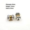 Two-tone Tibetan silver barrel bead with gold fret pattern 9x12mm for DIY jewelry - G-1 Silver Carved Pillar