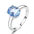Classic 925 sterling silver ring with a large oval sky blue gemstone in 4-prong setting - Size 5 / Oval Solitaire Style (RUJ095B-1) / Sky Blue