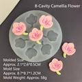 Detail der 8-Loch Kamelie Silikonform mit fertigen rosa Deko-Blumen aus Kunstharz - 8-Loch Kamelien-Form
