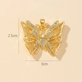 Macro shot of 2.5x3cm gold butterfly pendant with crystals and hollow wings detail - I-Hollow Butterfly (2.5x3cm)