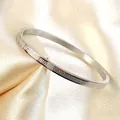 Bracciale classico in acciaio inossidabile argento con motivo a greca su raso champagne - 4mm / Color Acciaio