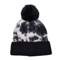 Close-up of black and white tie-dye knit hat with black faux fur pompom and ribbed cuff - Tie-dye Black & White