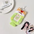 Detail of green fox plush photocard holder with transparent window for bag accessory - Green
