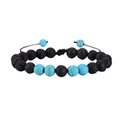 Detailed shot of adjustable macrame closure on lava rock and turquoise bead bracelet - Blue Turquoise + Volcanic