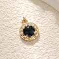 Golden round pendant with central black gemstone and zircon halo on white background - A0224 Round Black Agate Pendant - Gold