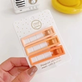 Set of 3 matte gradient orange square hair clips on card held by hand - Orange Square Set