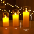 Three-piece set of warm yellow LED Christmas candles in elegant glass containers - Set of 3 (S/M/L)