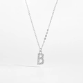 Macro shot of S925 sterling silver letter B pendant with sparkling pave diamonds - 925 Silver / Letter B