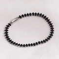 Detail of silver tennis bracelet with marquise-cut black zircons and secure clasp - Black Zircon - Platinum
