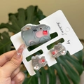 Detail of acrylic hair clip set featuring cute cartoon hippo and floral designs - Red Cheek Snowman Hippo Clip 3PCS Set