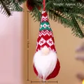 Knitted Christmas gnome ornament in red and green with Nordic patterns, 15cm height - Style J