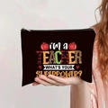 Close-up of canvas teacher makeup bag with zipper and superpower quote graphic - Teacher Superpower Leopard Apple (jiayingpbb0321)