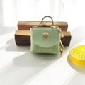 Mint green mini PU leather pouch keychain with wavy pattern and golden metal buckle - Light Green