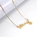 Gold stainless steel Taurus zodiac necklace with letter pendant and round engraved charm - Taurus