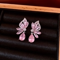 Detailed macro of pink teardrop crystal earrings in a black velvet jewelry gift box - Butterfly Waterdrop Earrings / Pink (925 Sterling Silver Earring Post)