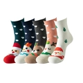 Detailed flat lay of five pairs of Christmas themed cotton socks with festive patterns - Black Christmas Theme Set