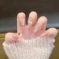 Faux ongles faits main avec nœud et cœur dans un style French ovale long - M / 10 Pièces/Paquet (Fait à la main) / Style Nœud de Coeur (BY2037)