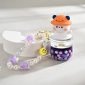 Creative purple liquid bottle keychain with mini bear figure and beaded smile charm - Chain Style / Purple