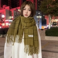 Olive green checkered scarf with fringe trim and brand label in outdoor street night view - Olive Green